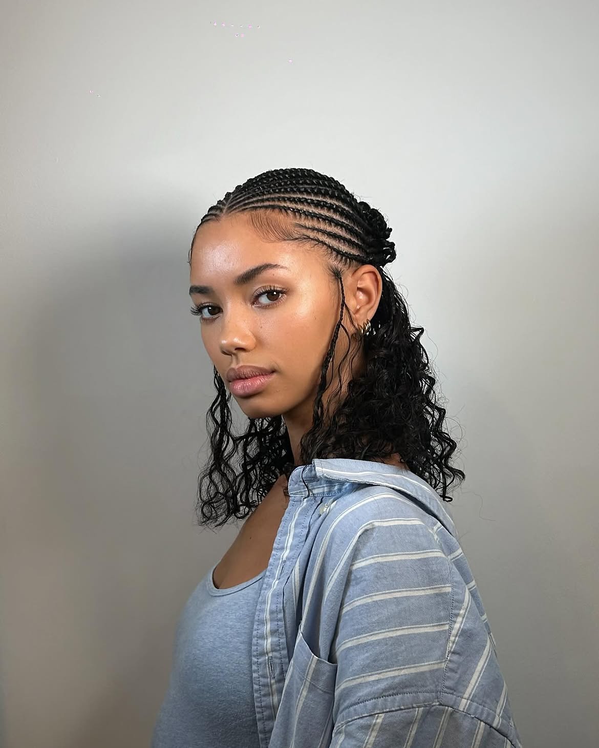 Half Up Cornrows With Curly Flowing Ends