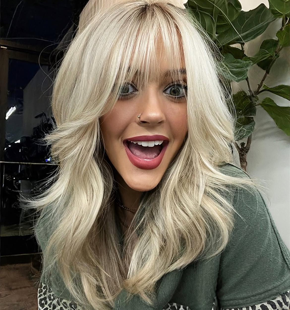 Honey Blonde Layers With Wispy Face-Framing Bangs