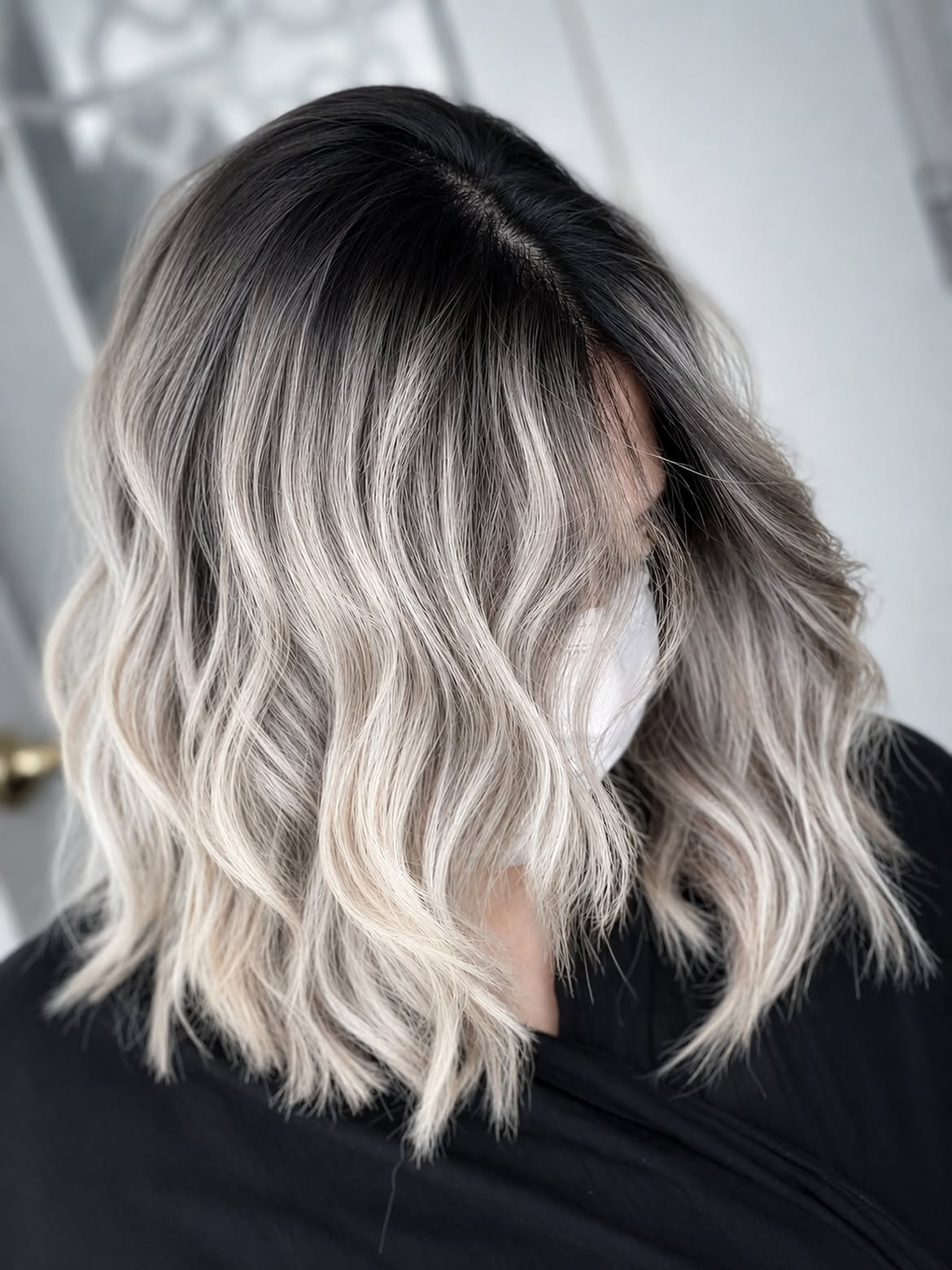 Icy Platinum Blonde Lob With Deep Shadow Root