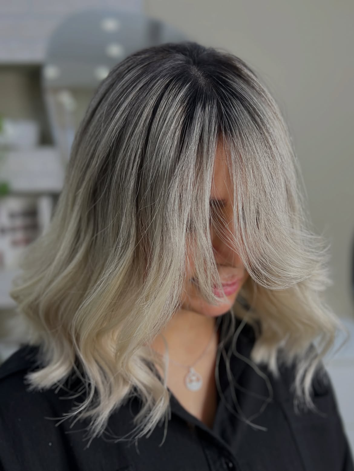 Icy Platinum Blonde Lob With Deep Shadow Root