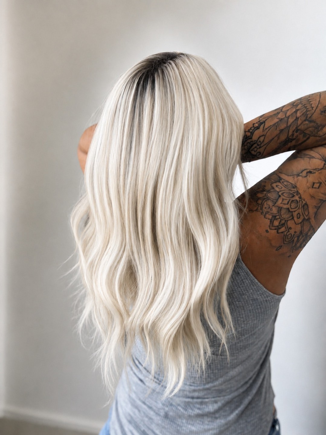 Icy Platinum Blonde Waves With Dark Shadow Root