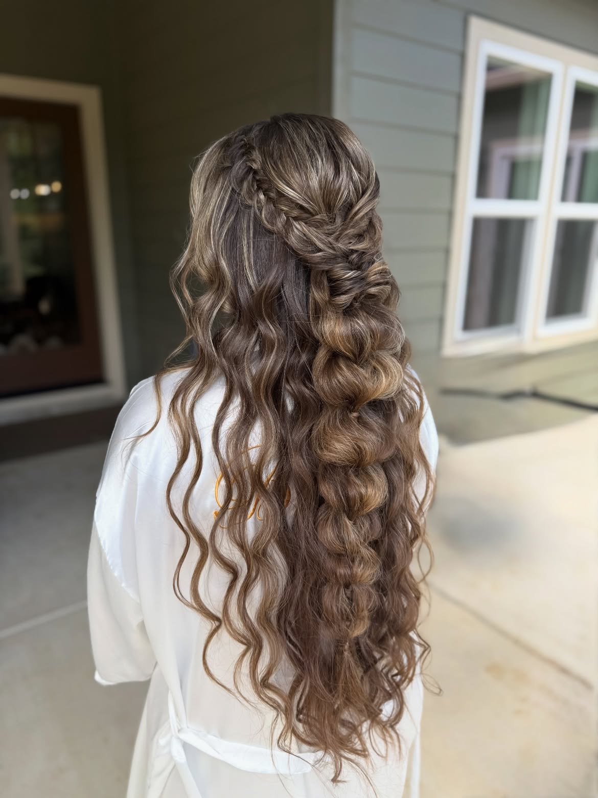 Intricate Crown Braid With Cascading Curls