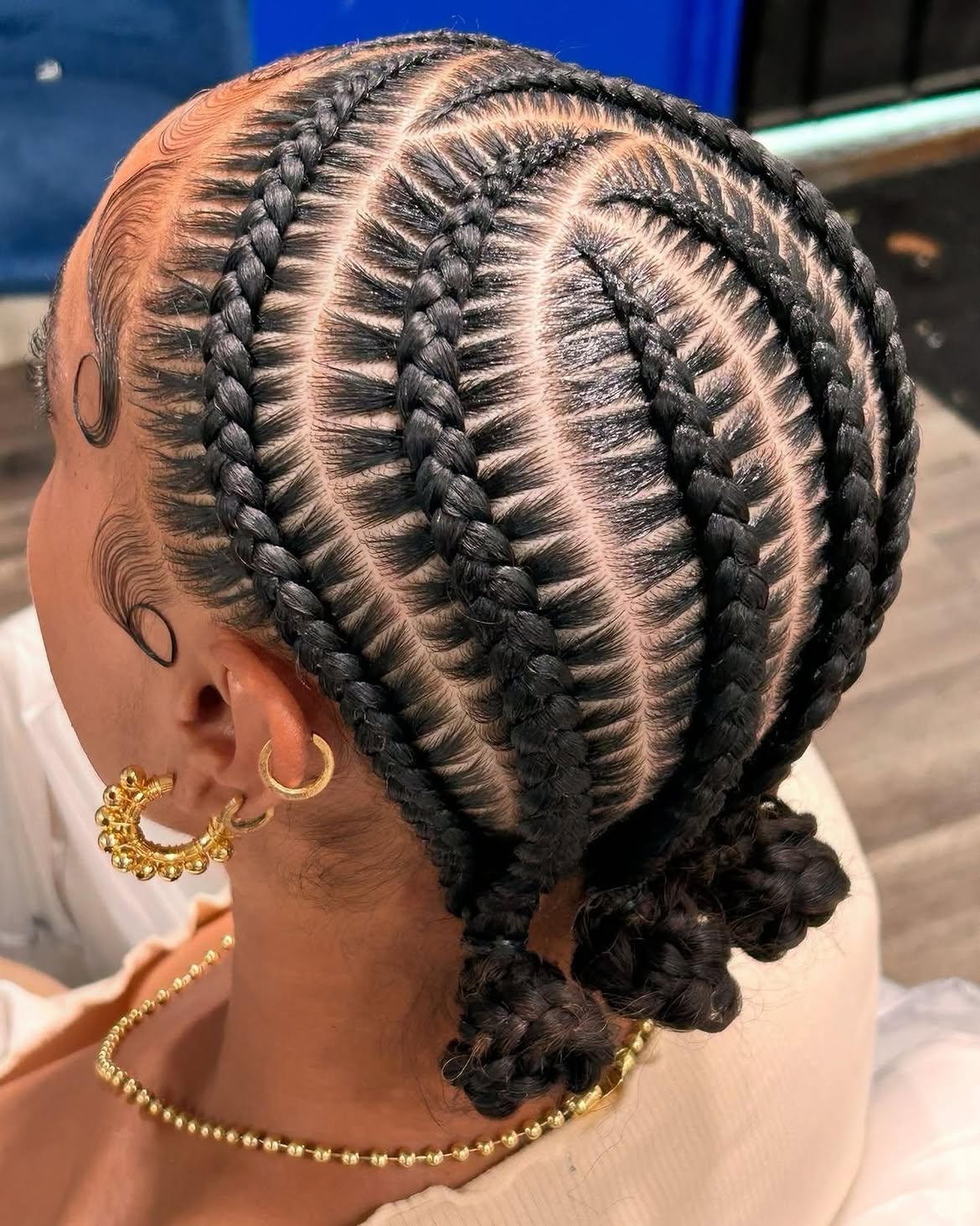 Intricate Feed In Cornrows With Low Buns