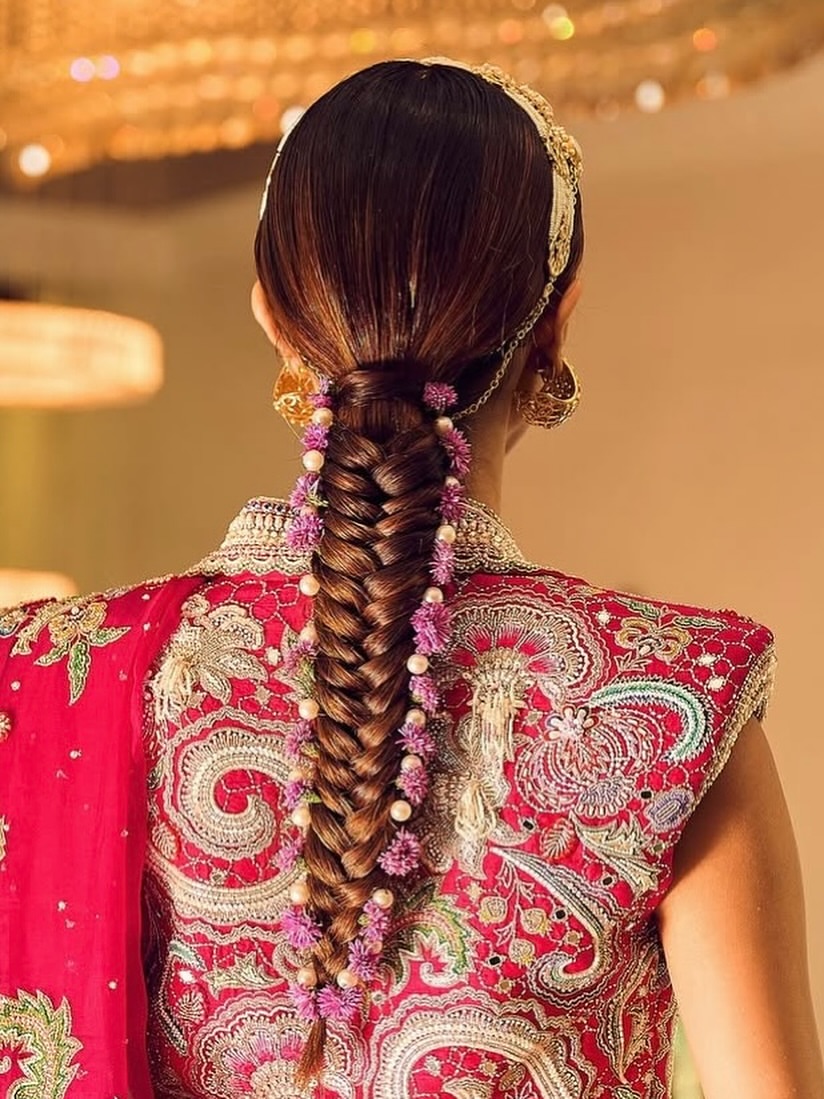 Intricate Fishtail Braid With Floral Embellishments