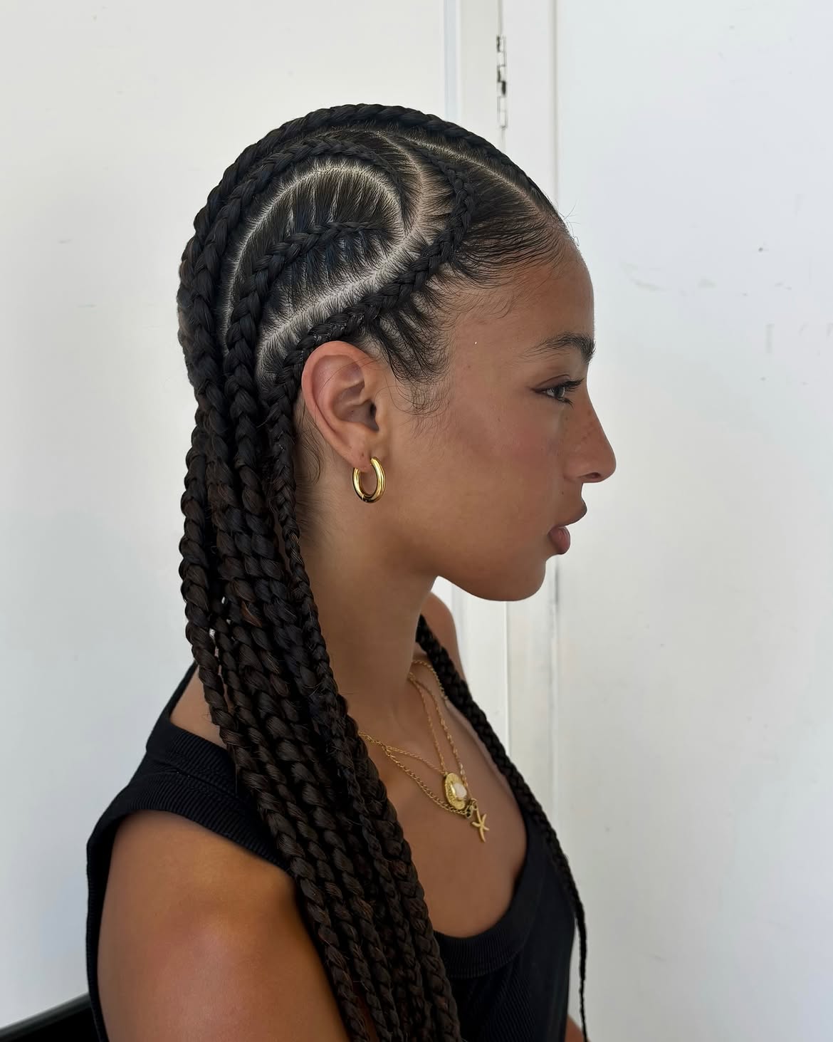 Intricate Swirl Pattern Feed In Cornrow Braids