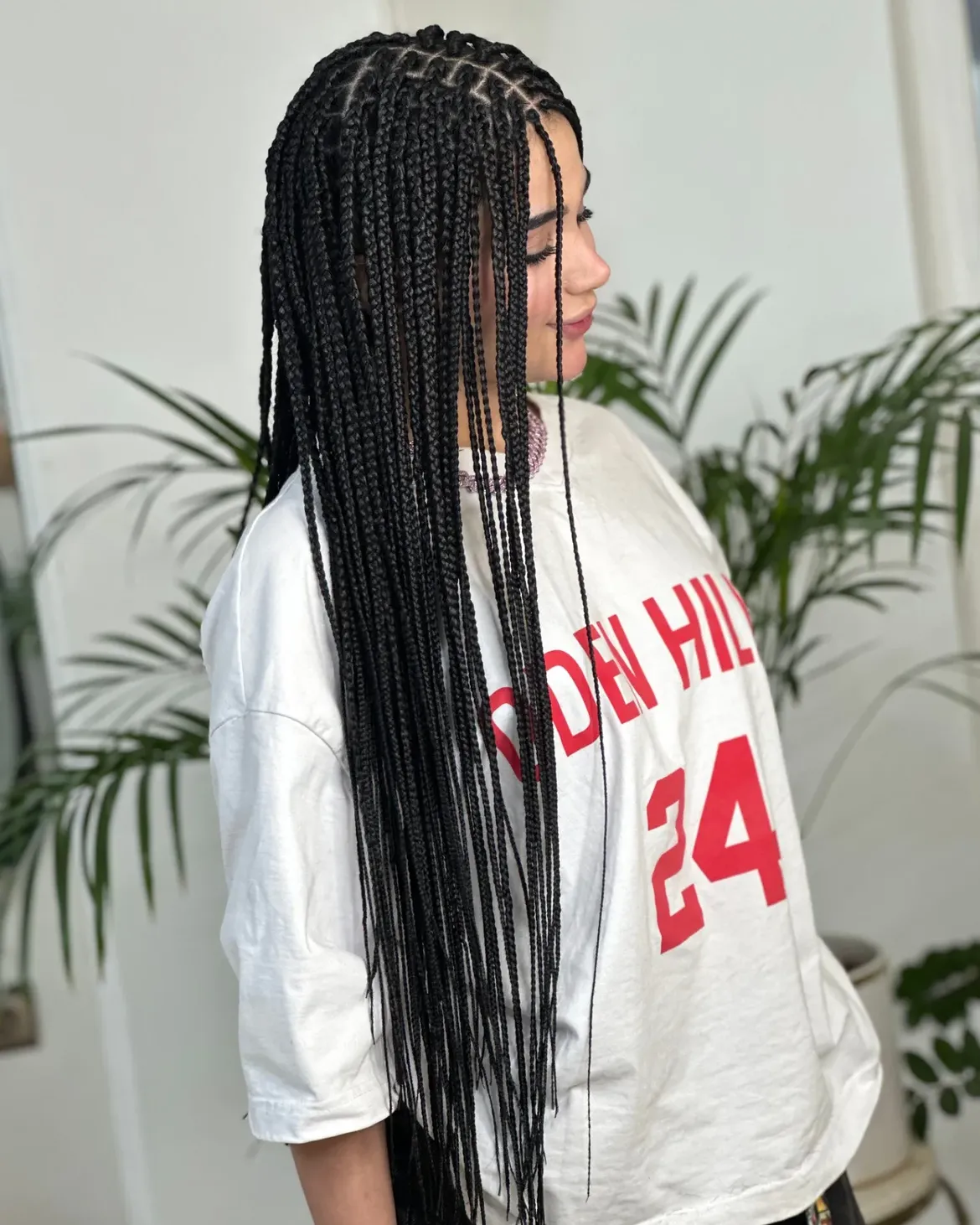 Long Braids With Defined Parts and Clean Finish