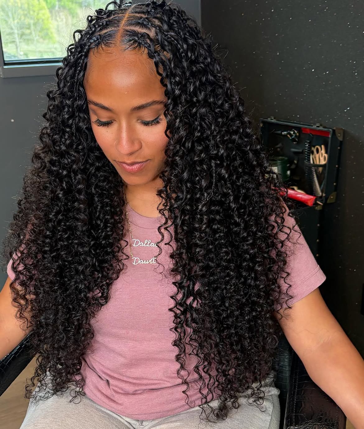 Long Curly Knotless Braids With Deep Part