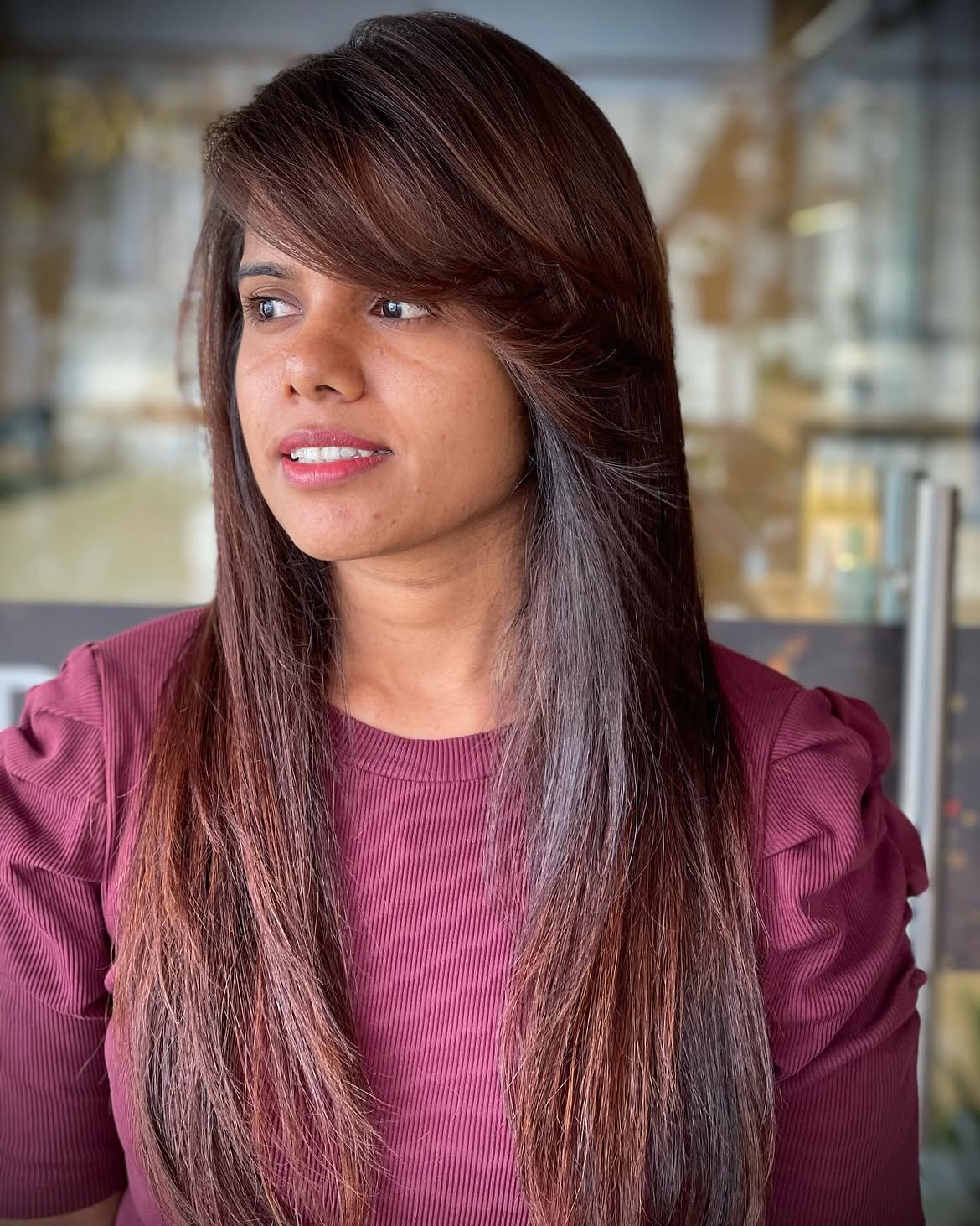 Long Side-Swept Bangs With Subtle Highlights