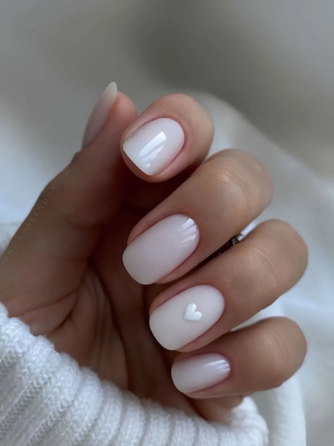 Matte Milky White Oval Nails with 3D Heart Accent