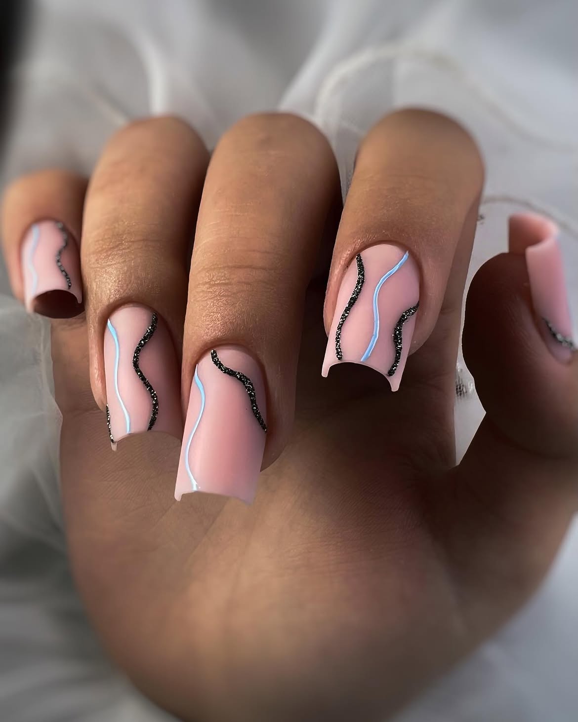 Matte Pink Swirl Square Nails with Glitter Accents