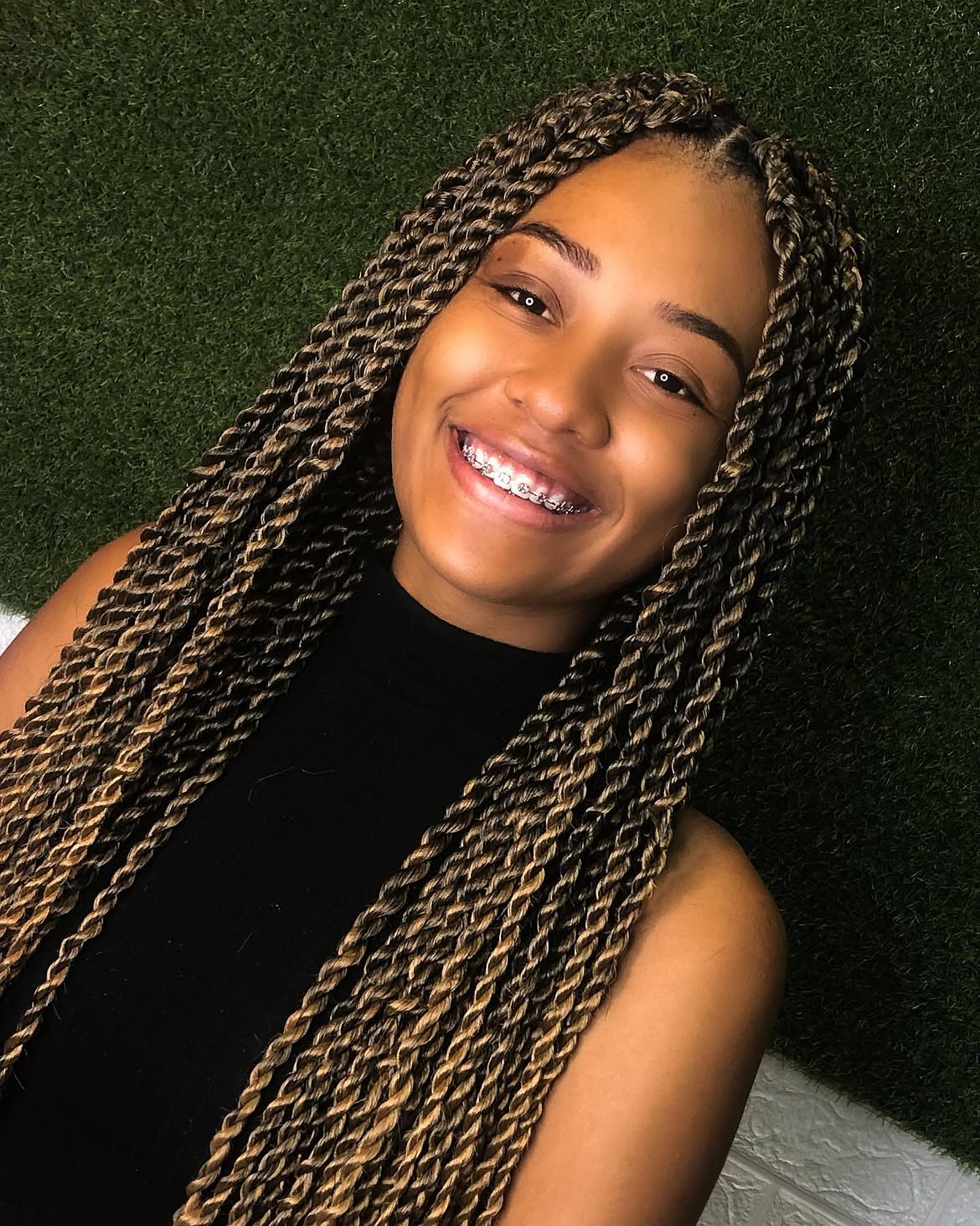 Medium Length Kinky Twists With Honey Blonde Highlights