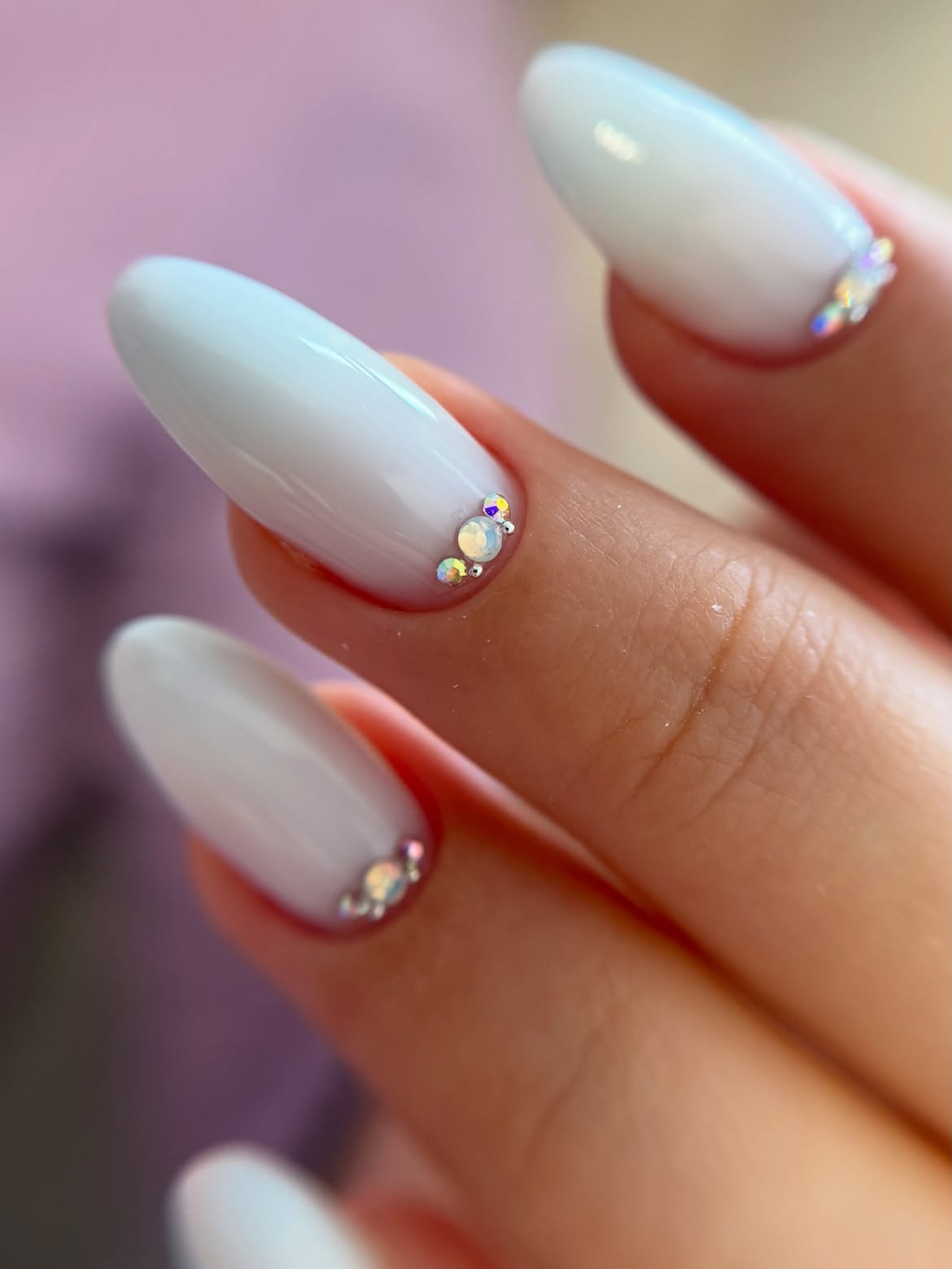 Milky White Oval Nails With Crystal Accents