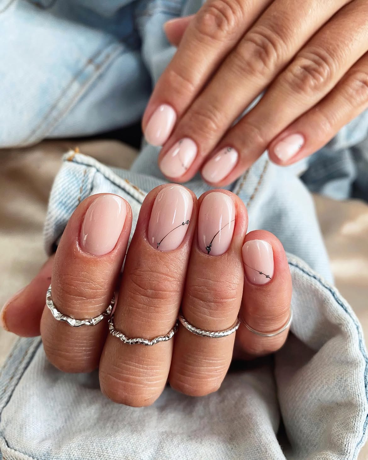 Minimalist Blush Nude Nails with Delicate Black Line Art