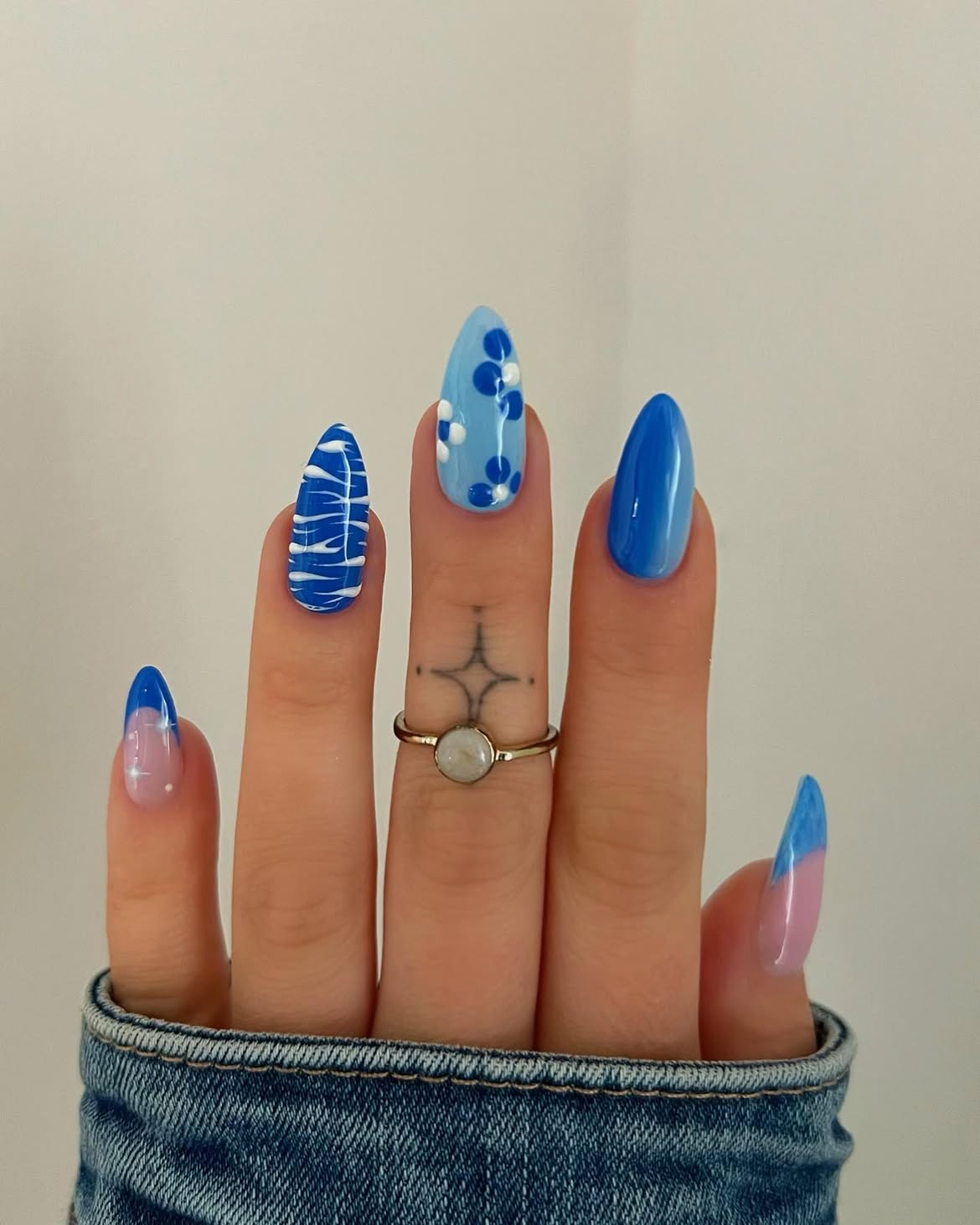 Mixed Blue Floral and Swirl Almond Nails