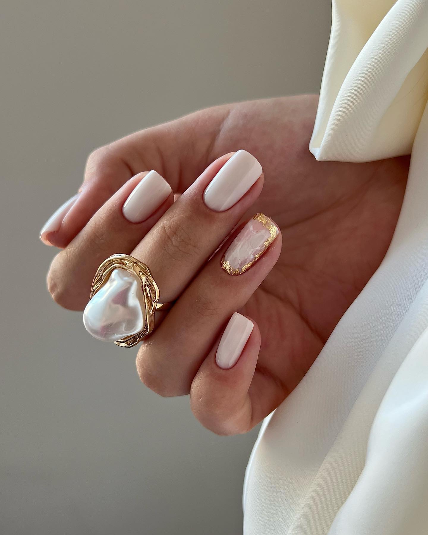 Pearlescent White Nails with Gold Leaf Accent