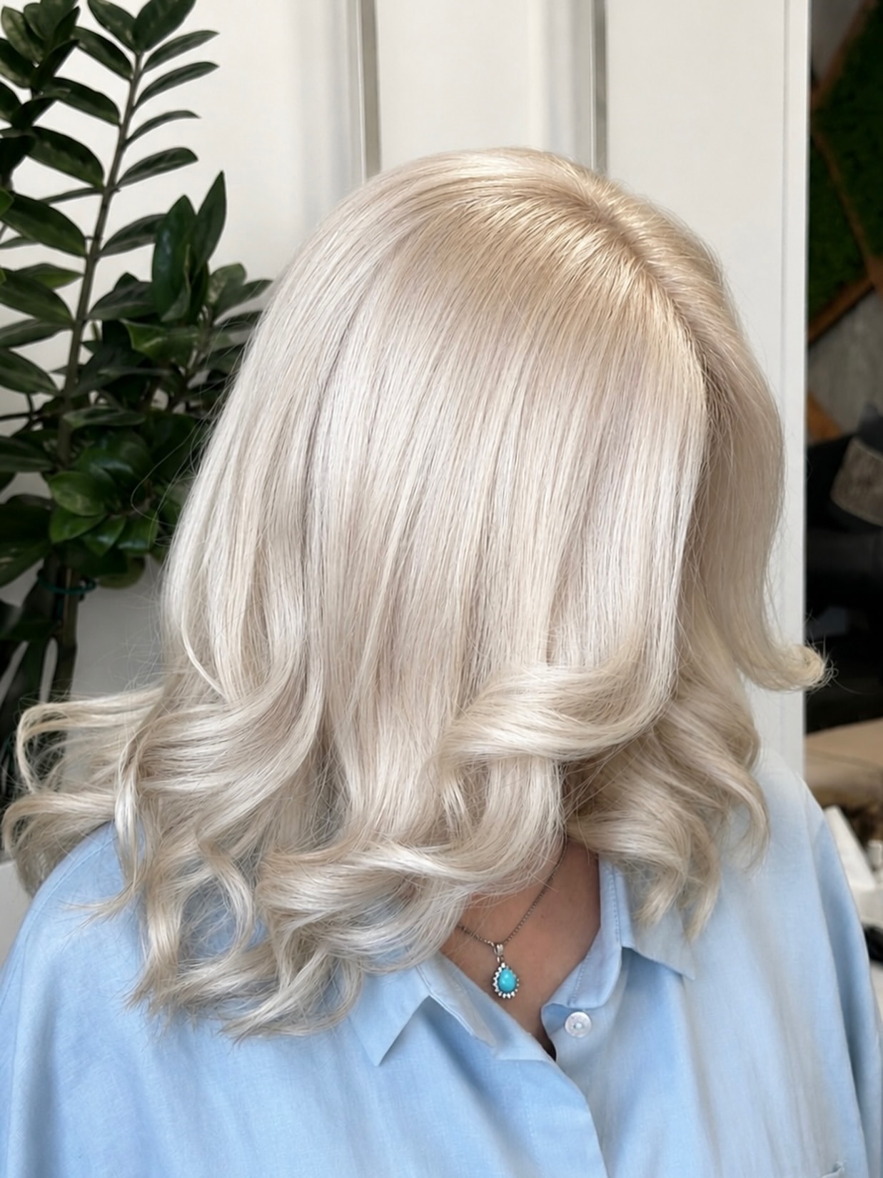 Platinum Blonde Glam Waves With Face Framing Layers
