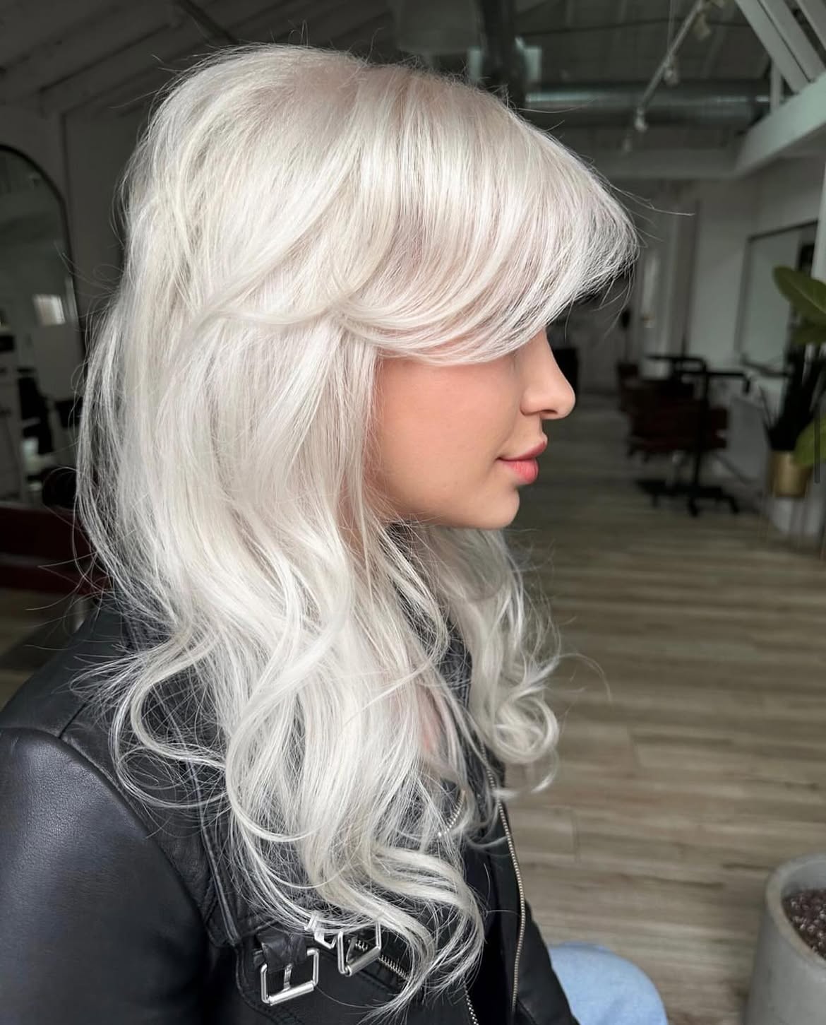 Platinum Blonde Shag With Voluminous Curtain Bangs