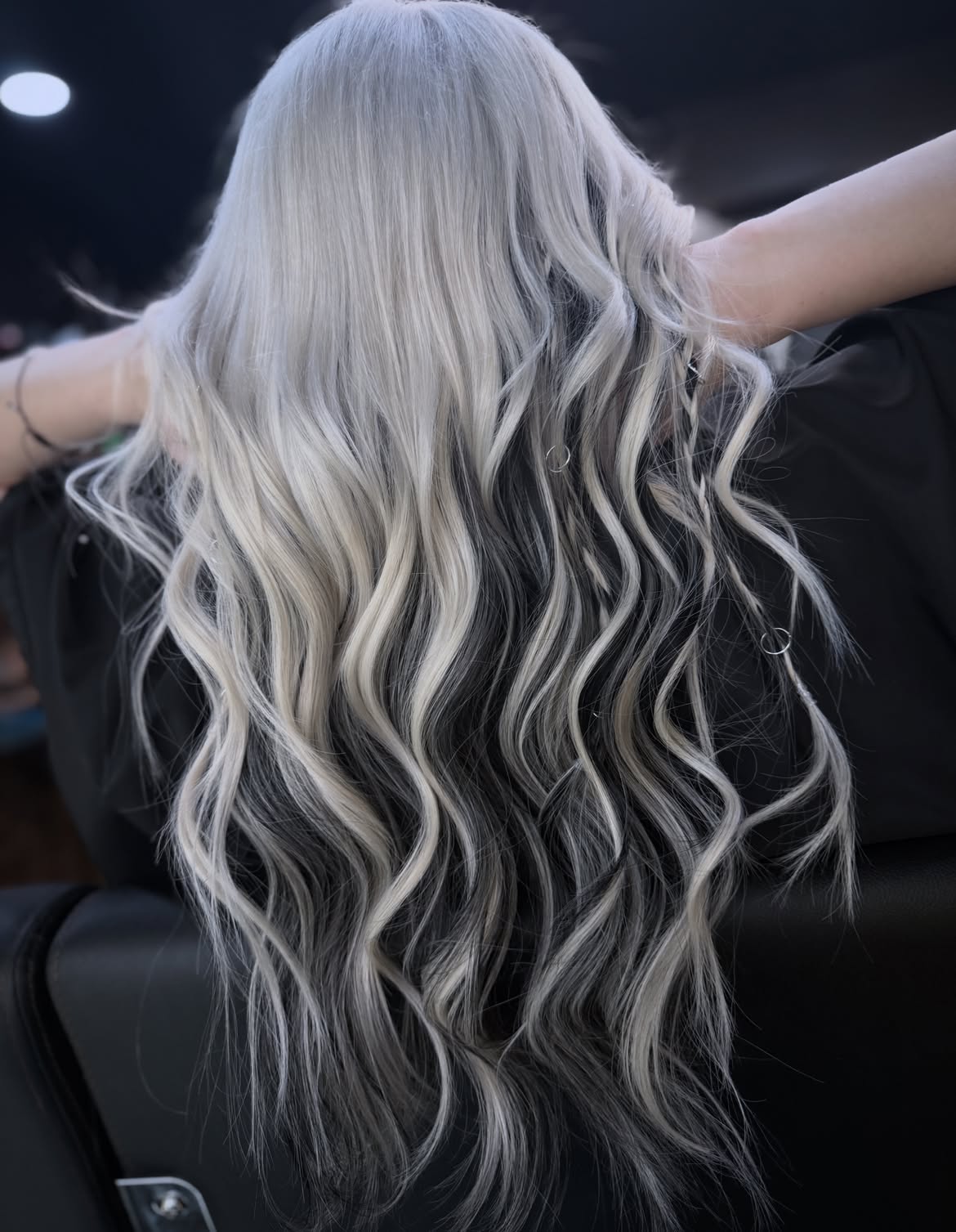 Platinum Blonde Streaks On Deep Black Waves