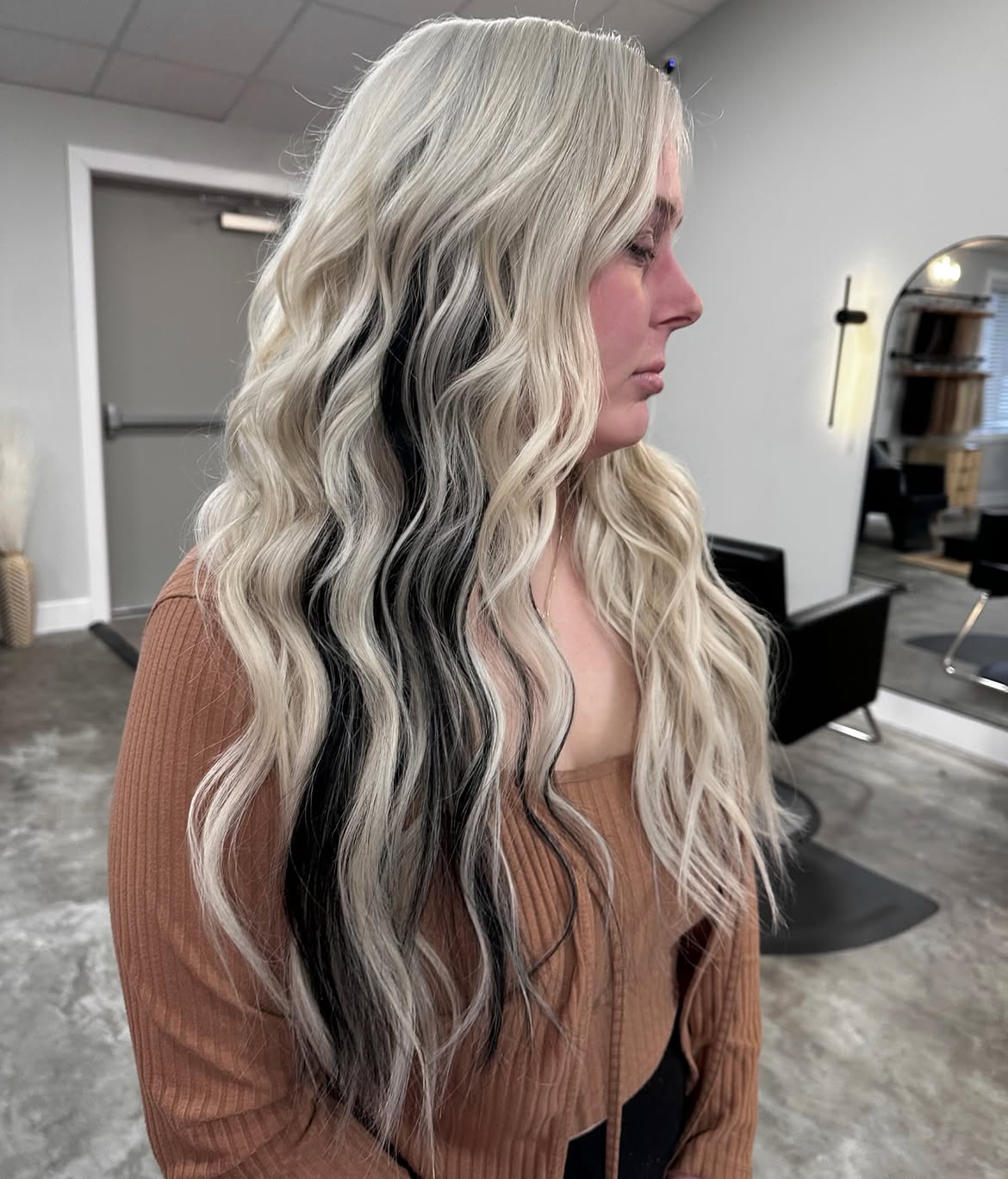 Platinum Blonde Waves With Bold Black Underlights