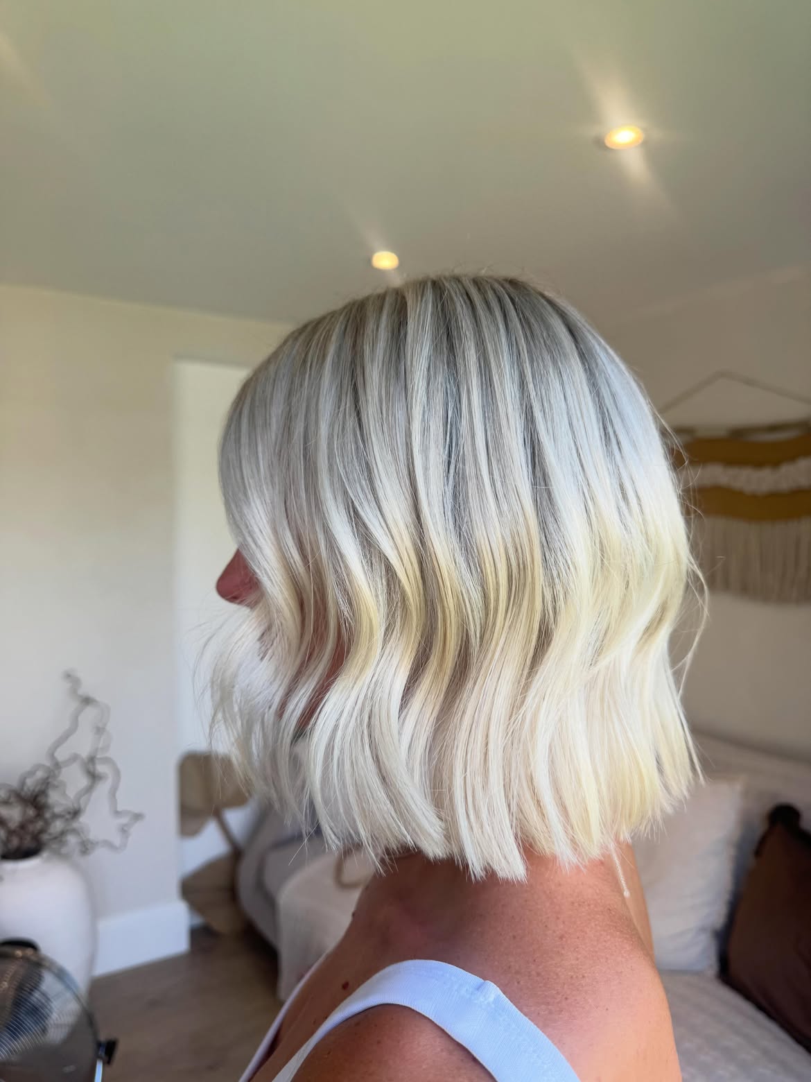 Platinum Blonde Wavy Bob With Textured Ends