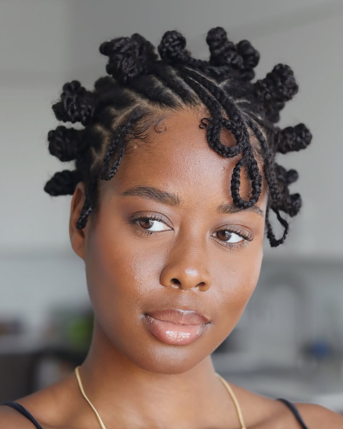 Playful Bantu Knots With Defined Baby Hairs