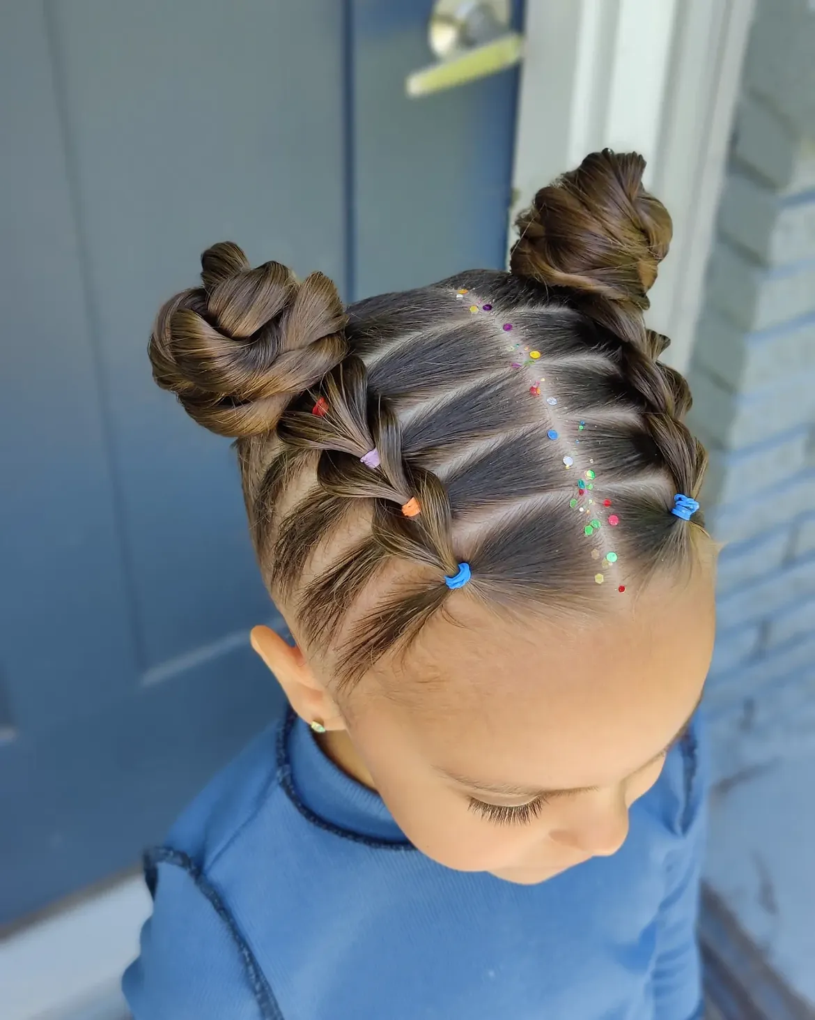 Playful Braided Space Buns With Colorful Elastic Accents