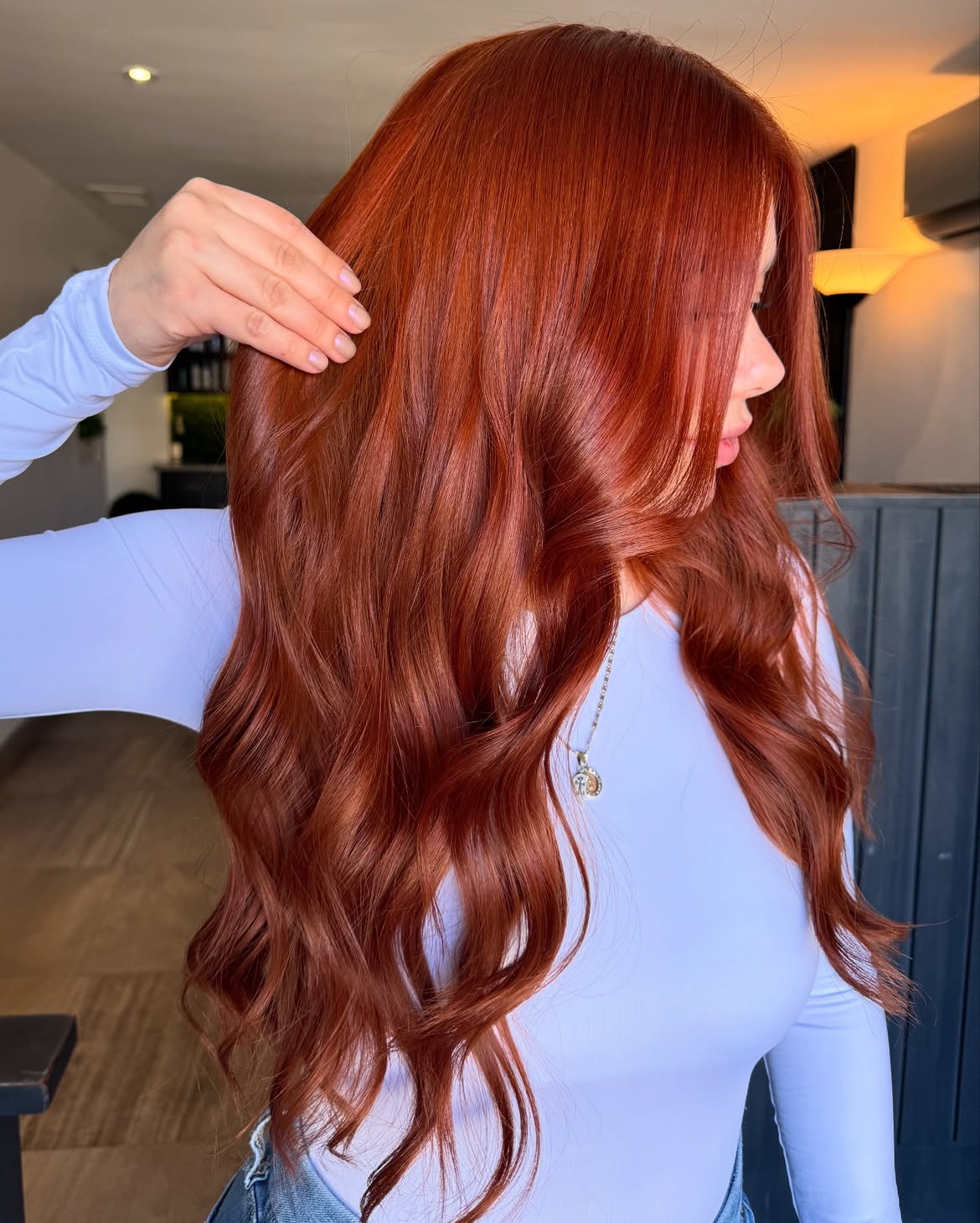 Rich Auburn Waves With Subtle Face Framing