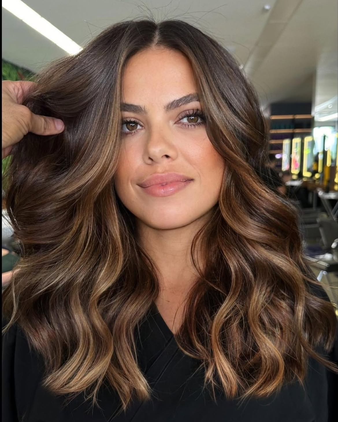 Rich Brunette Waves With Soft Caramel Highlights