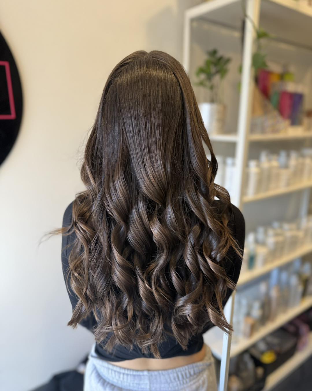 Rich Brunette Waves With Subtle Dimensional Highlights
