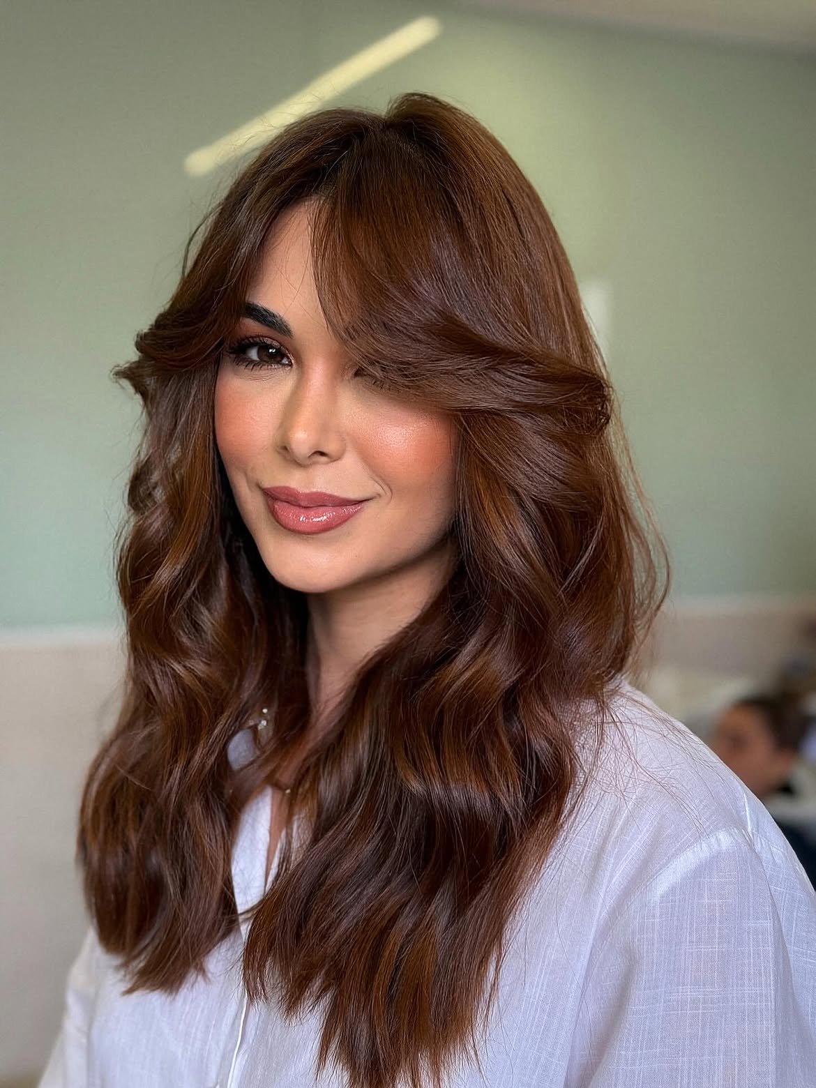 Rich Chocolate Brown Waves With Face-Framing Layers
