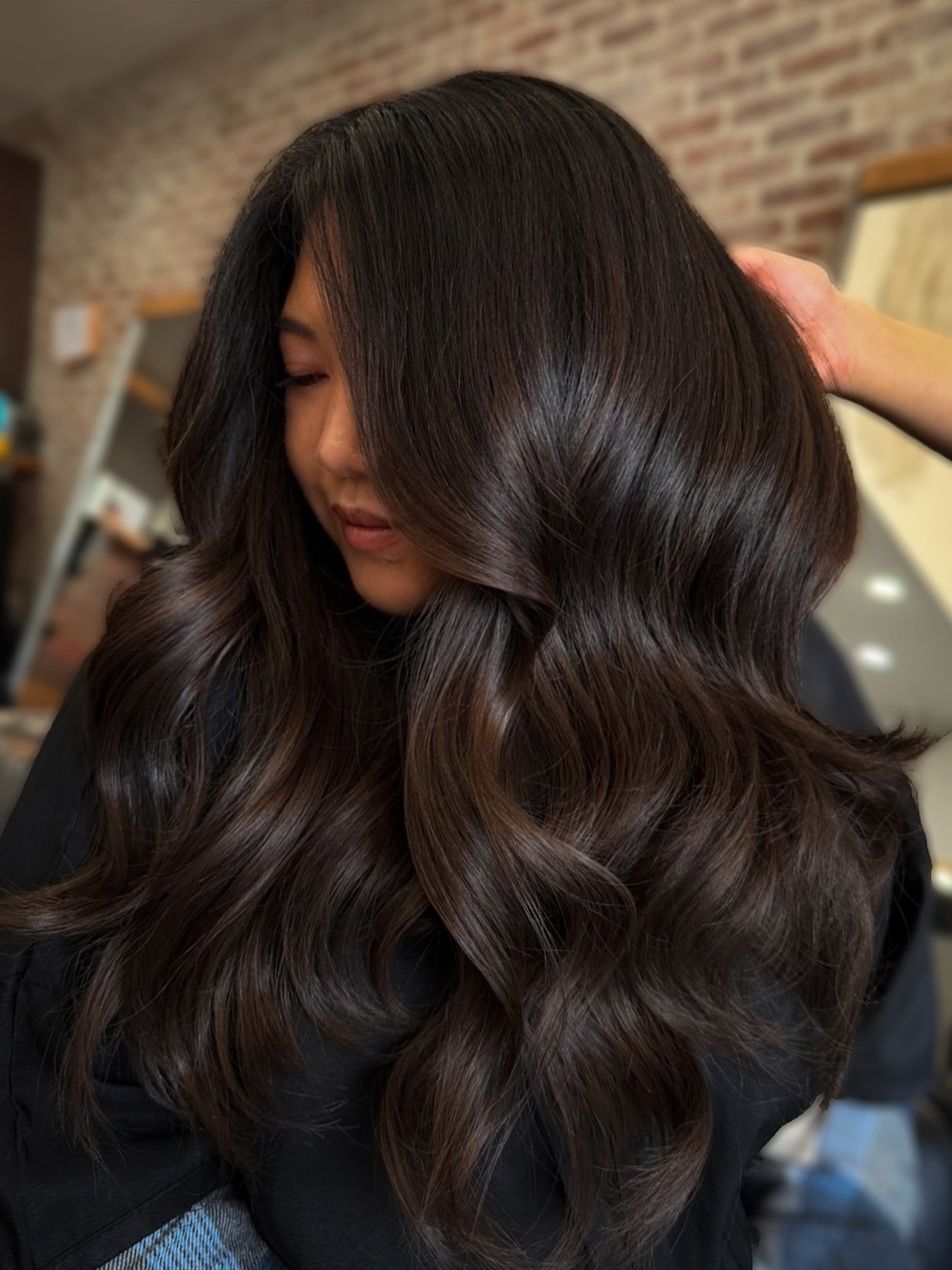 Rich Chocolate Brown Waves With Face-Framing Layers