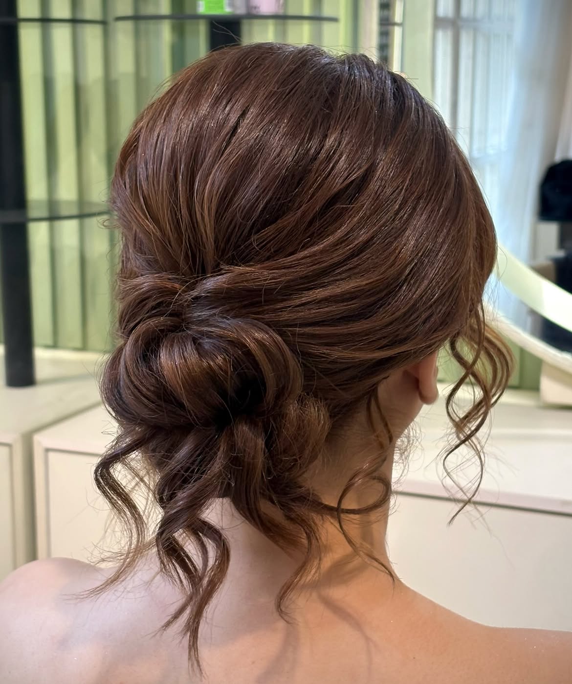 Romantic Updo With Loose Curls and Twists