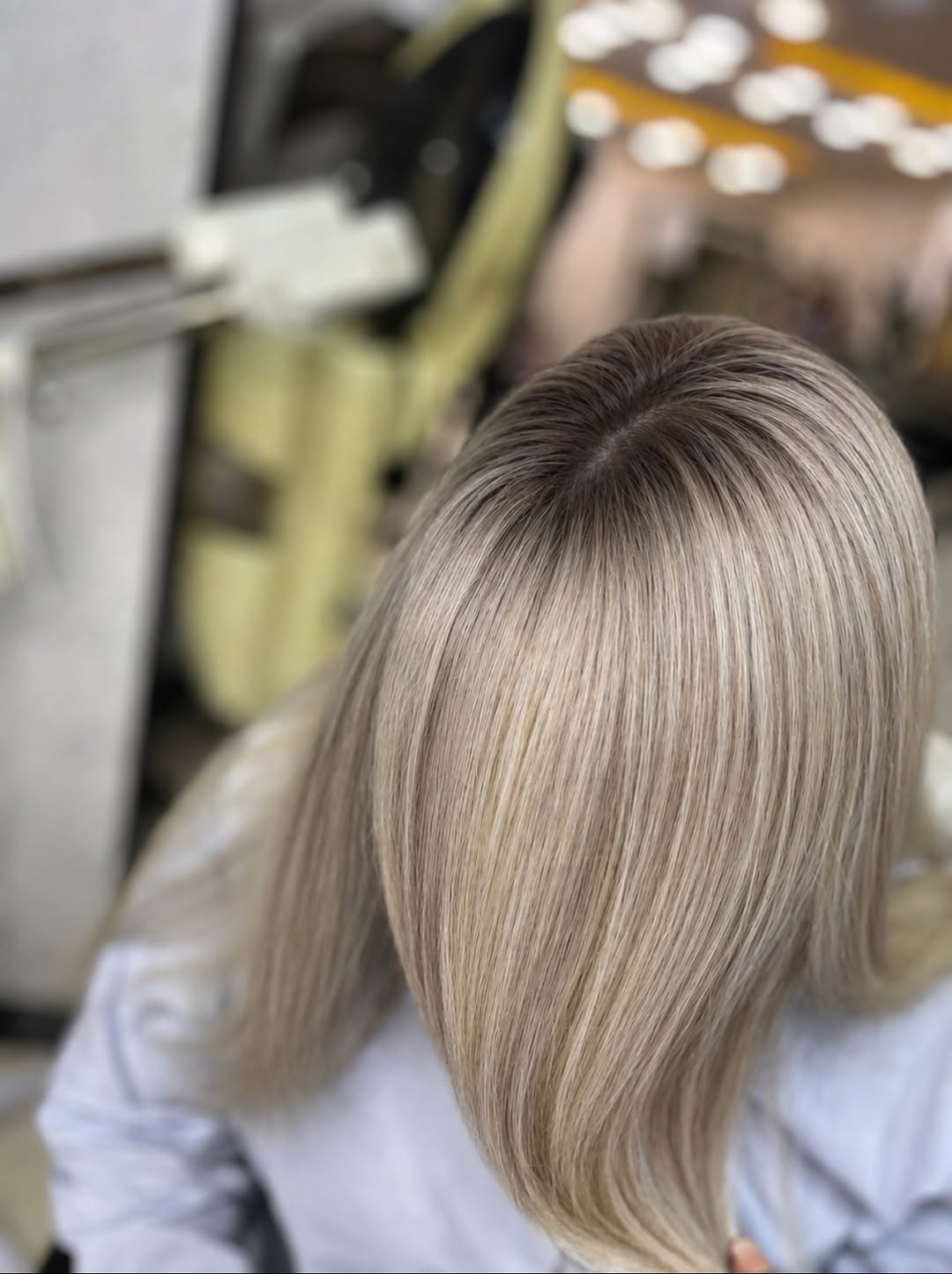 Seamless Ash Blonde Shadow Root On Mid Length Hair