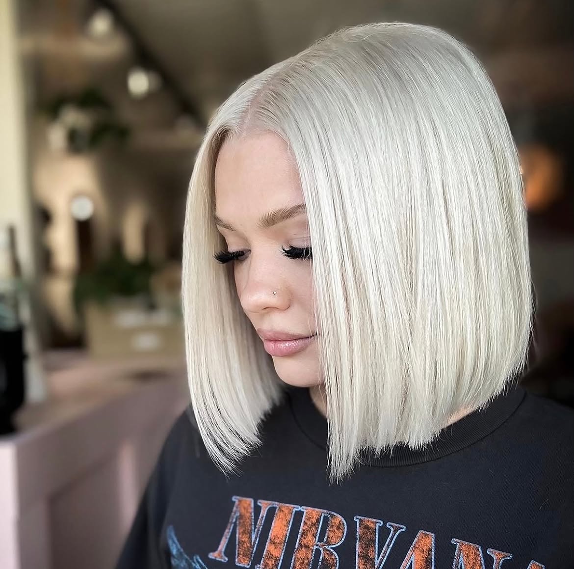 Sharp Platinum Blonde Blunt Bob With Glossy Finish