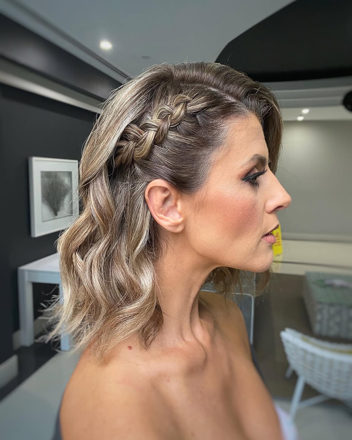 Side Braid With Loose Waves And Deep Side Part