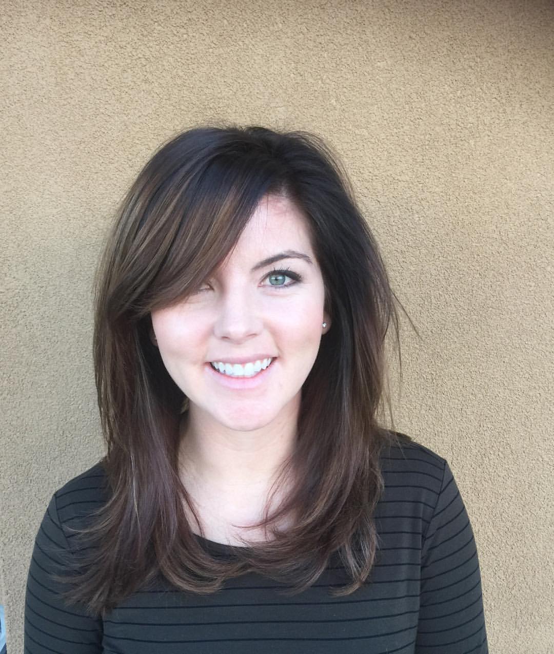 Side Swept Bangs With Soft Layered Brown Hair