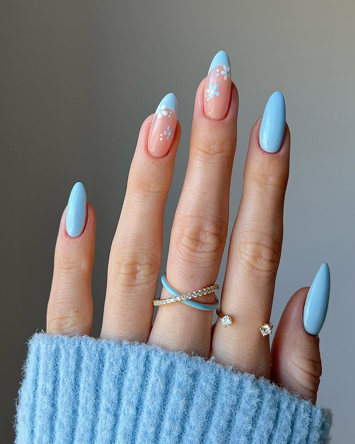 Sky Blue French Tip Floral Almond Nails