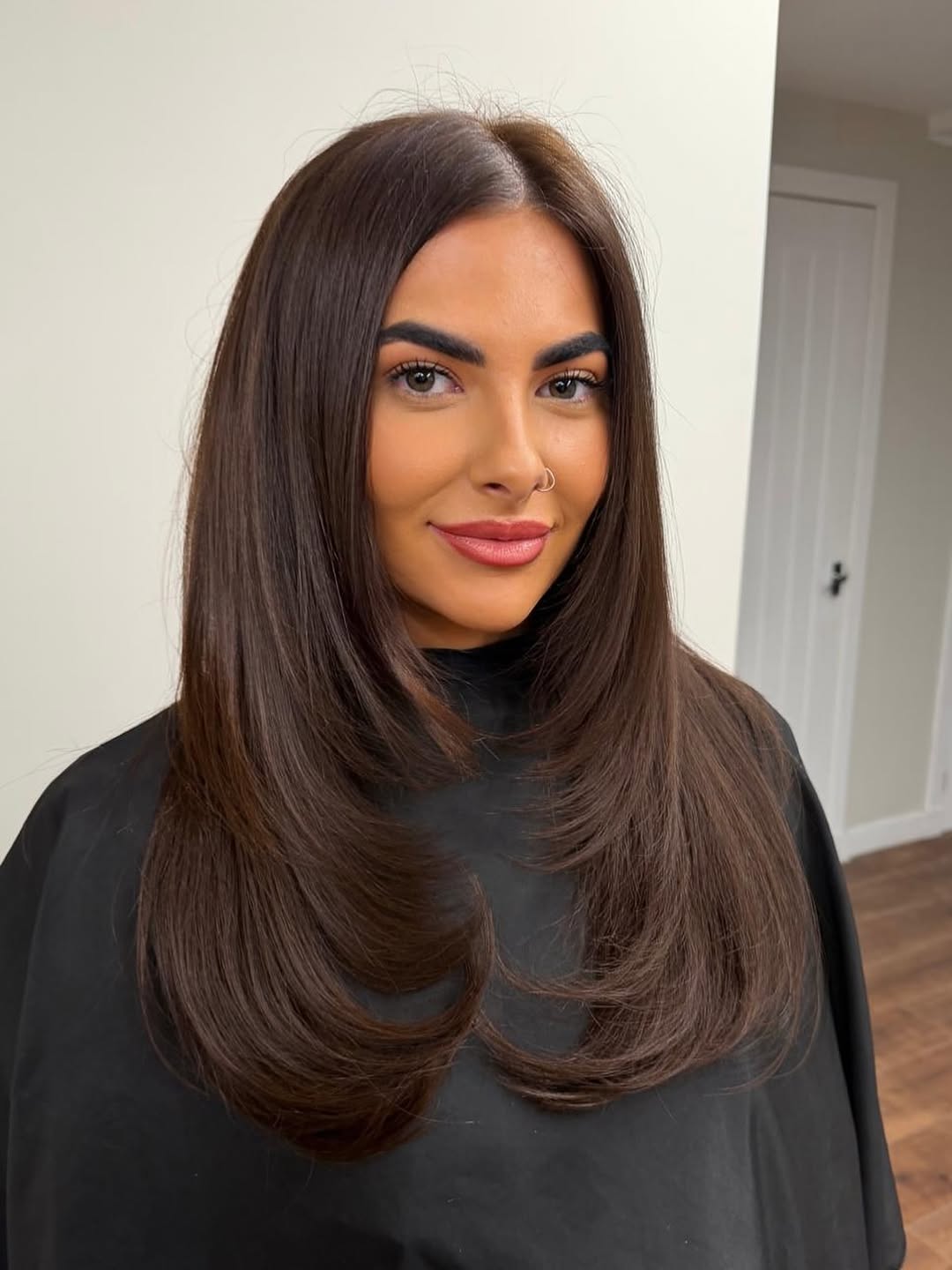 Sleek Blowout With Rounded Face Framing Layers