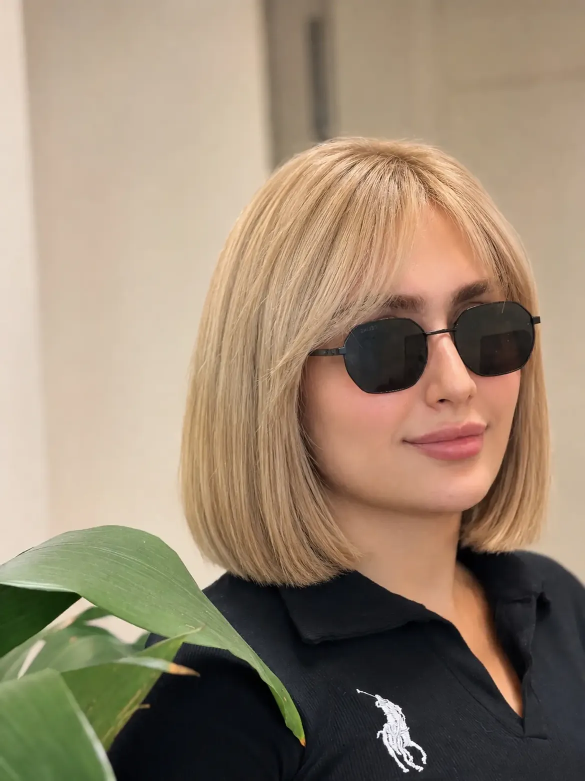 Sleek Chin Length Bob With Wispy Curtain Bangs