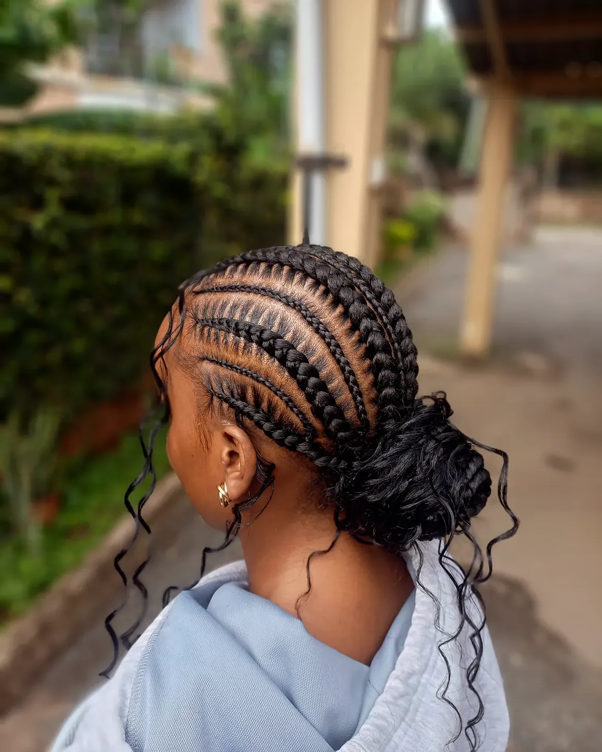 Sleek Cornrow Braids Into Low Messy Bun