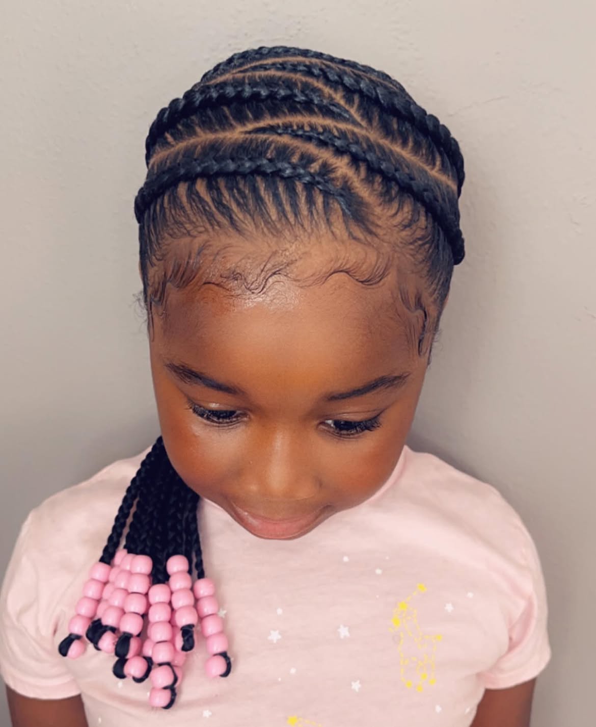 Sleek Cornrow Braids With Classic Pink Beads