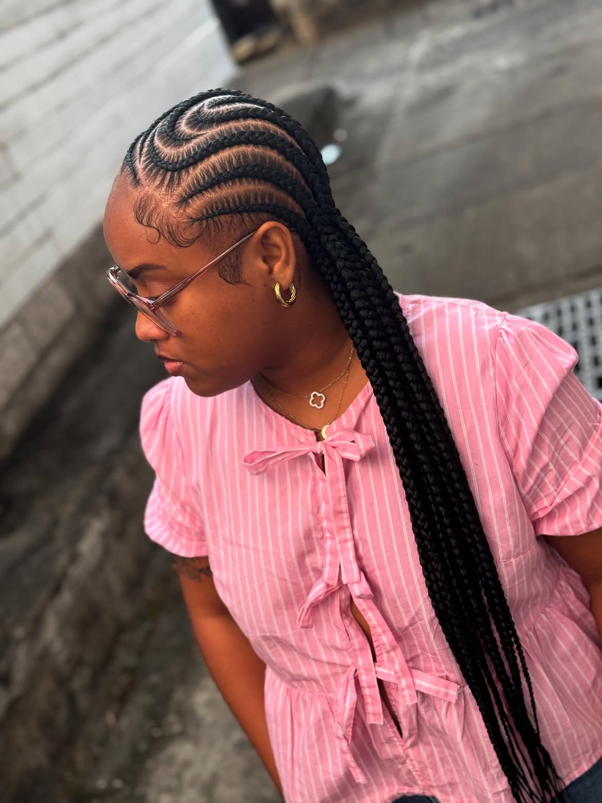Sleek Curved Cornrow Braids With Laid Edges