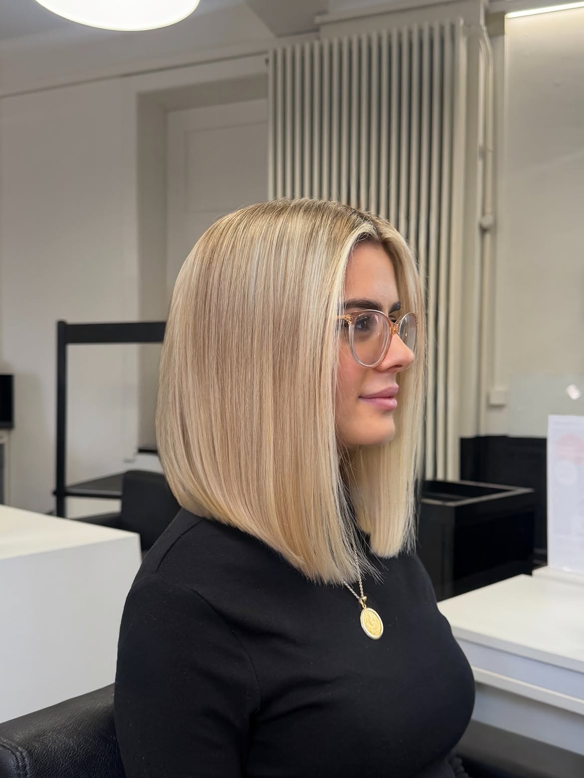 Sleek Honey Blonde Bob With Face Framing Layers