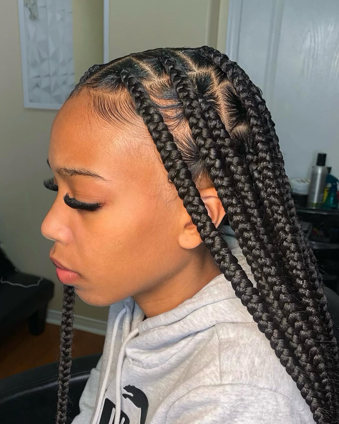 Sleek Jumbo Box Braids With Defined Parts