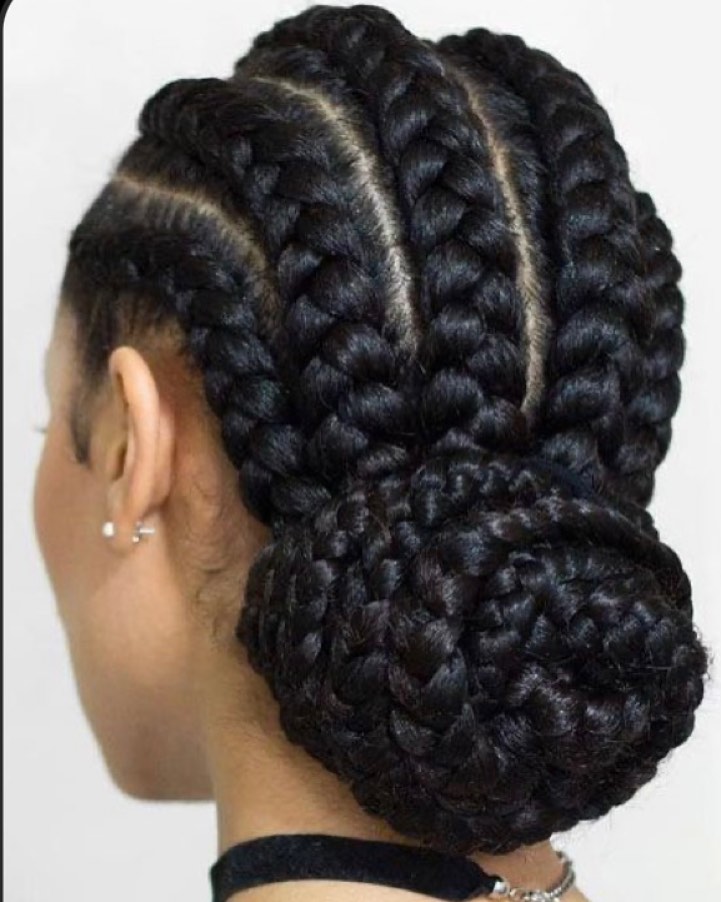 Sleek Jumbo Braids Updo With A Low Bun