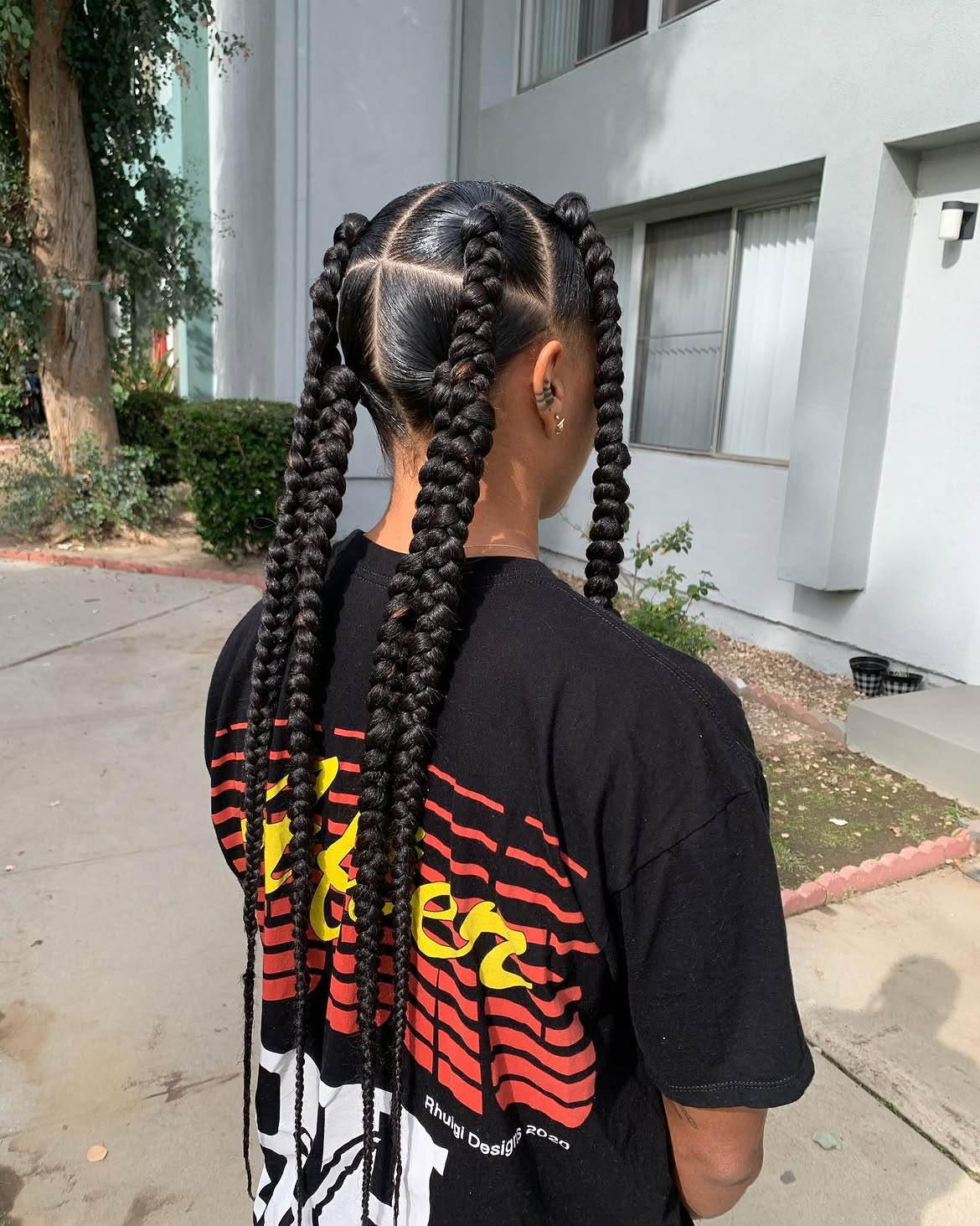 Sleek Jumbo Braids With Defined Parts