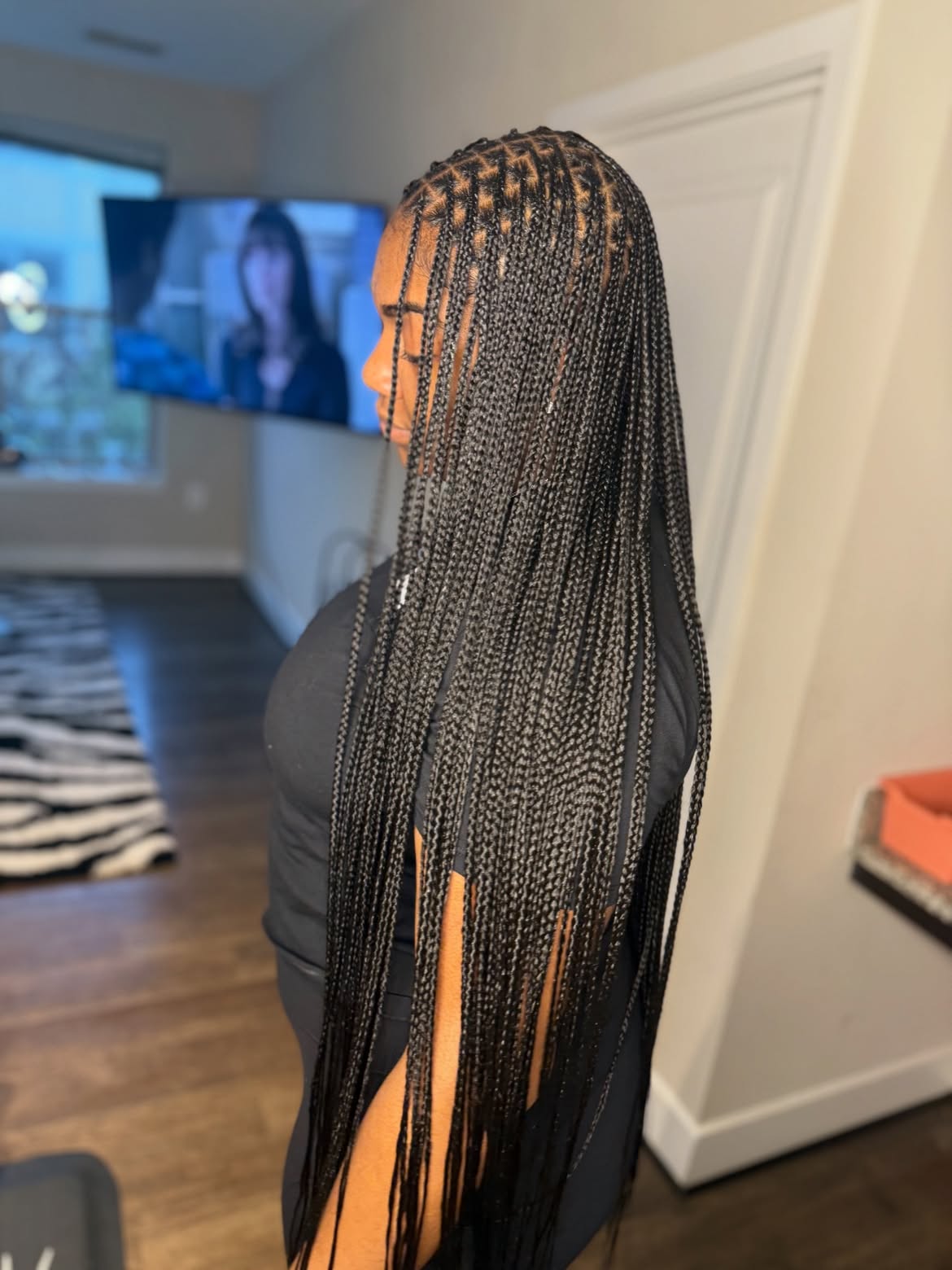 Sleek Micro Box Braids With Defined Parts