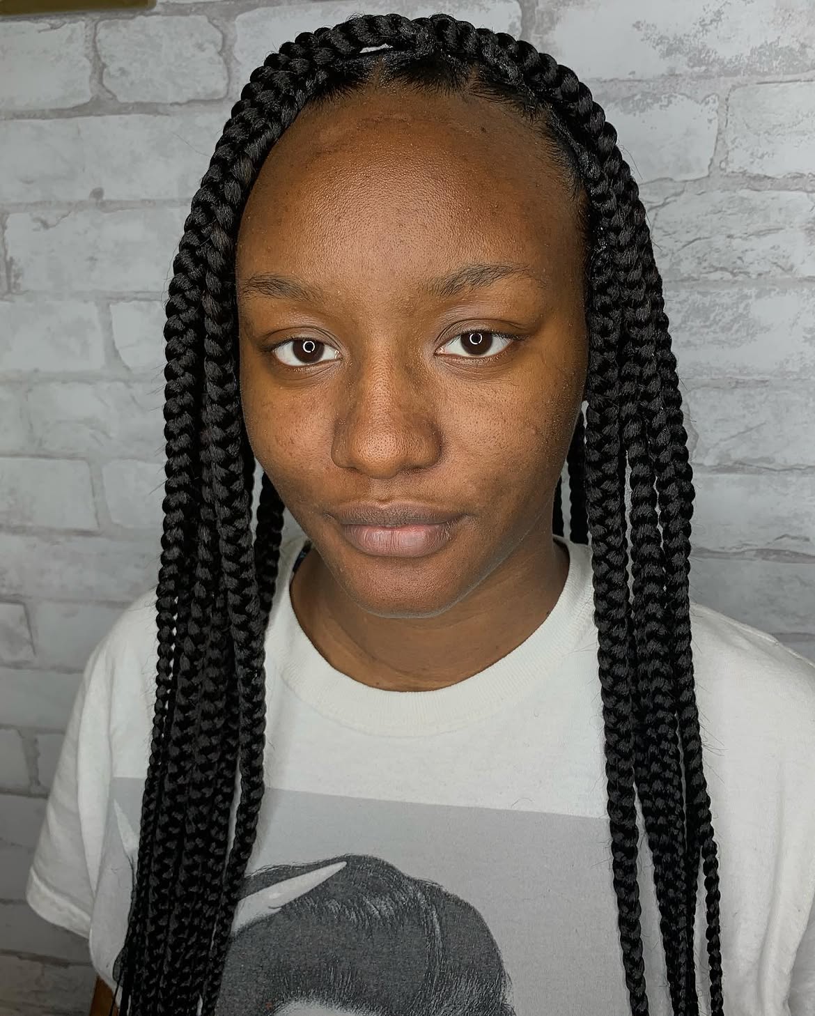 Sleek Mid-Back Length Knotless Braids