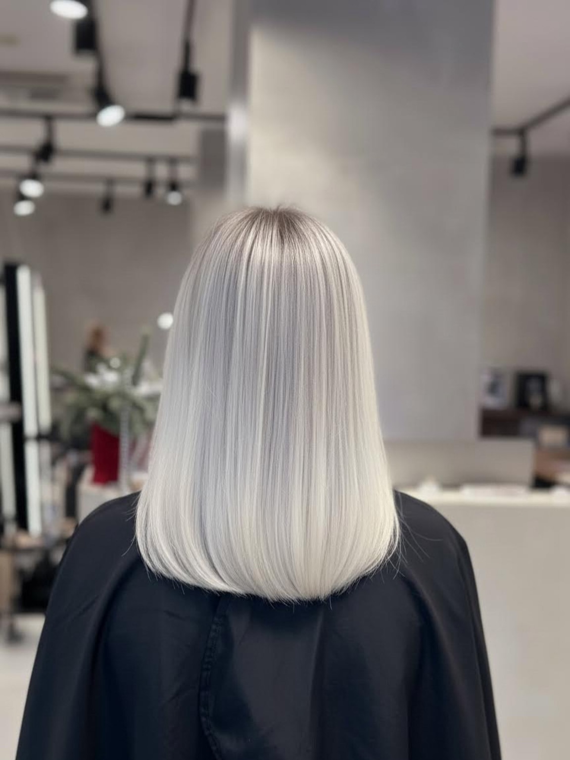 Sleek Platinum Blonde Blunt Cut Bob