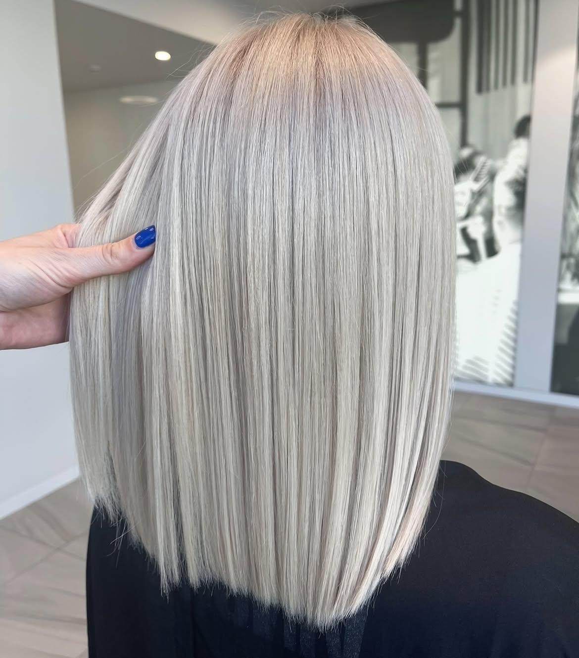 Sleek Platinum Blonde Collarbone Cut